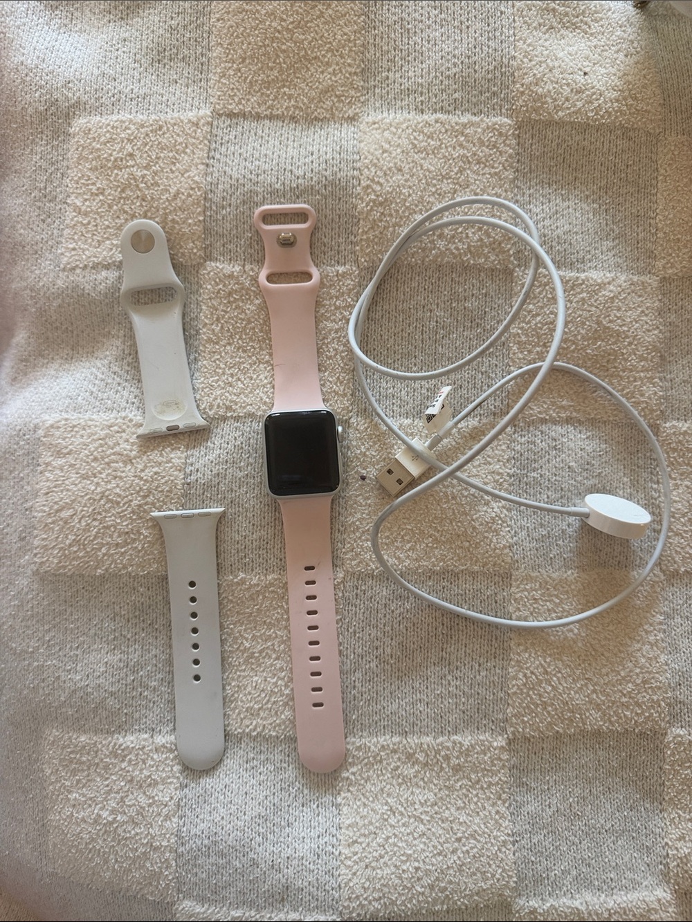 Apple Watch Series 3 complete with white and pink silicone bands and charger!